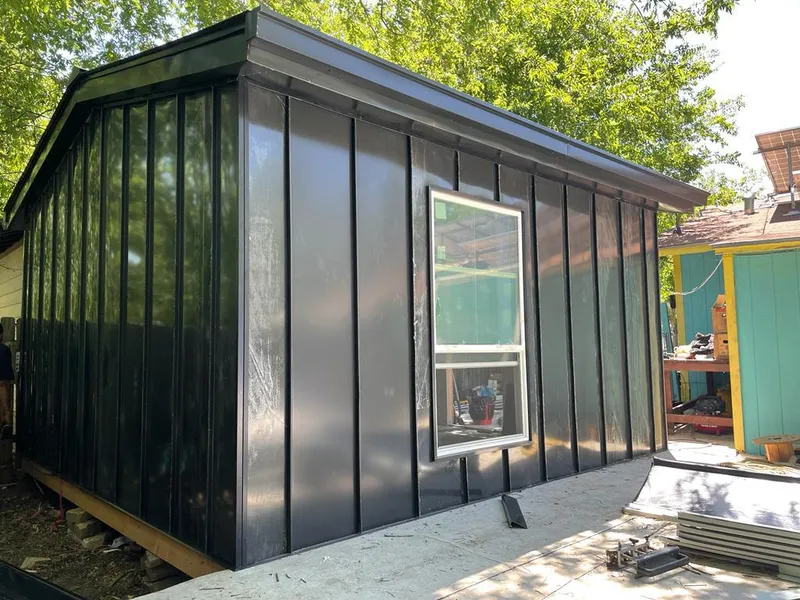 Black standing seam metal wall panels for Roof Inspection in Nolensville